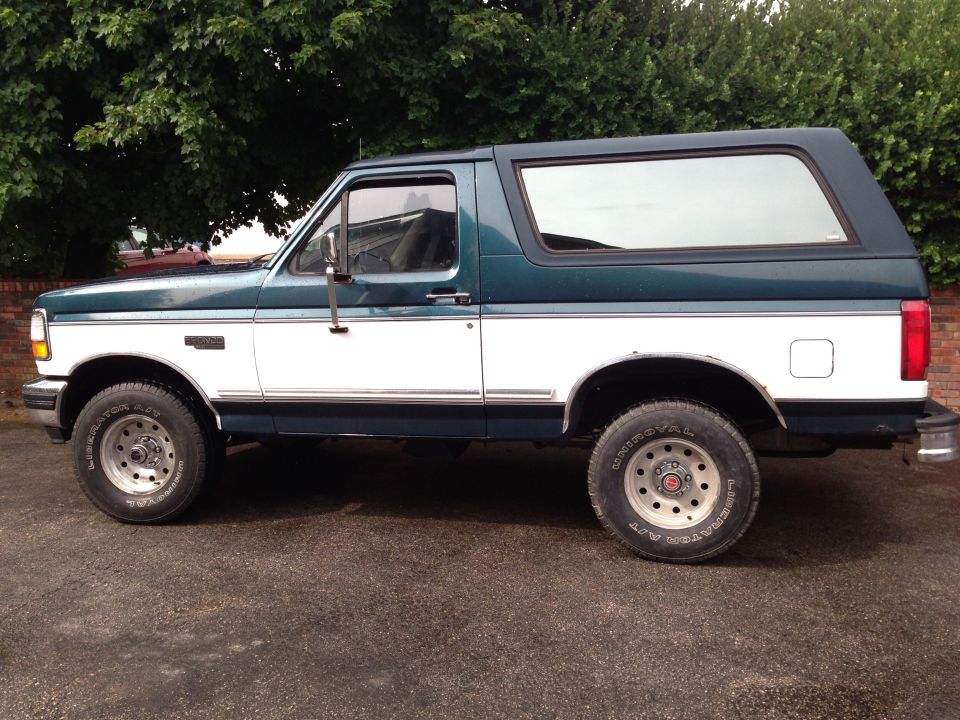 Side view of a 1994 Ford Bronco, two-tone green and white