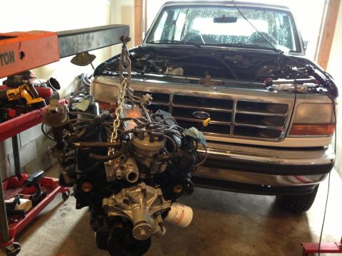 1994 Ford Bronco - Engine removal in progress for a 1994 Ford Bronco.