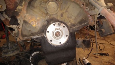 1995 Ford Bronco - Close-up of an engine block and transmission bell housing, indicating a mechanical part rather than a complete vehicle.