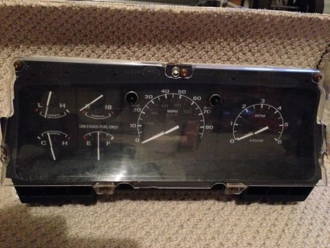 1995 Ford Bronco - Instrument cluster MPH, RPM, fuel, and temperature gauges.