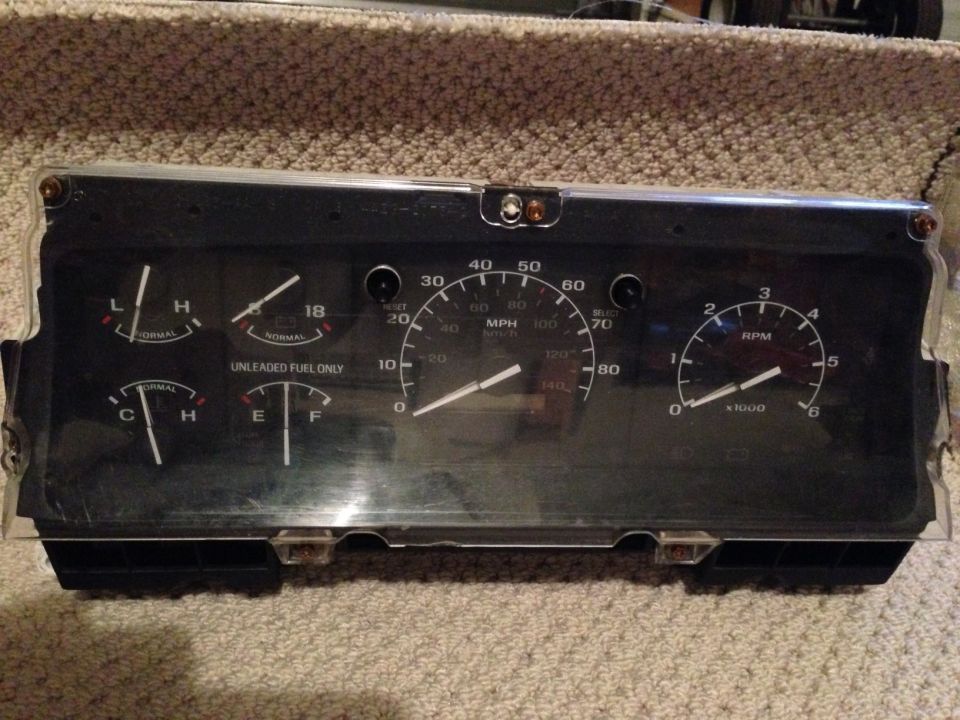 Instrument cluster with MPH and RPM gauges
