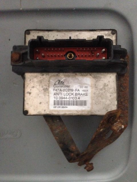 1995 Ford Bronco - This is an Anti Lock Brake controller module with visible part numbers and connectors.