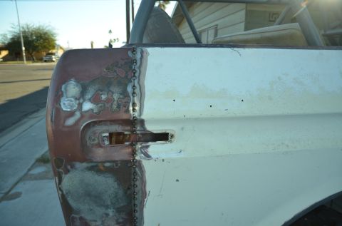 1979 Ford Bronco - This 1978 Ford Bronco shows extensive bodywork and primer on the rear quarter panel.