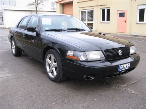 2003 Mercury Marauder - Front 3/4 view of a black 2003 Mercury Marauder with a custom grille.