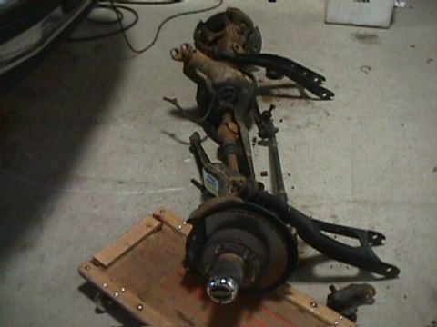 1996 Ford Bronco - Front axle assembly removed from a vehicle, likely for repair or modification.