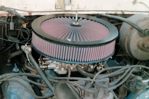 1979 Ford Bronco - Close-up view of an engine bay a prominent aftermarket air filter assembly.
