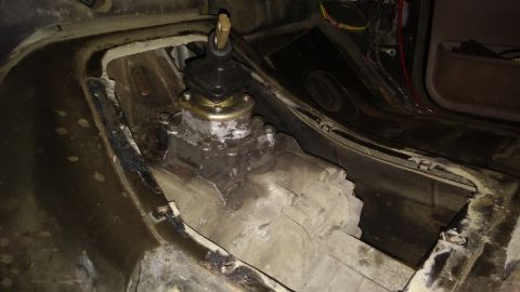 1995 Ford Bronco - Close-up of a manual transmission shifter assembly, likely part of a vehicle modification.