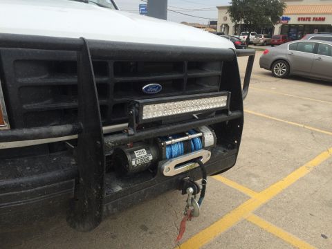 1996 Ford Bronco - Front view of a 1996 Ford Bronco showing its heavy-duty bumper, winch, and LED light bar.