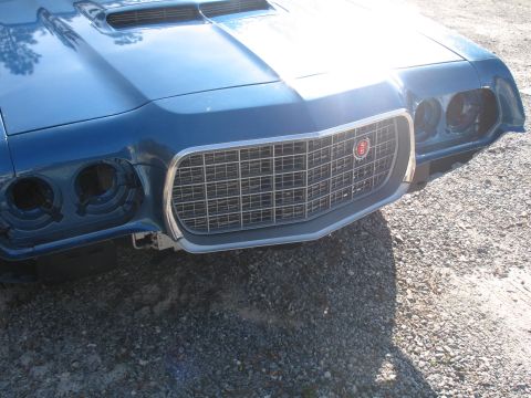 1972 Ford Ranchero - Front view of a 1972 Ford Ranchero showing its distinctive grille and hood scoop.