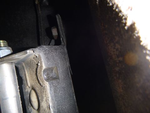 1953 Plymouth Belvedere - Detail of a metal bracket assembly, possibly from a vehicle's undercarriage.