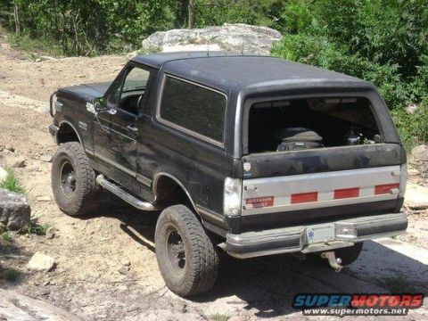 1988 Ford Bronco - This 1988 Ford Bronco is shown in a rear 3/4 view on a dirt trail.