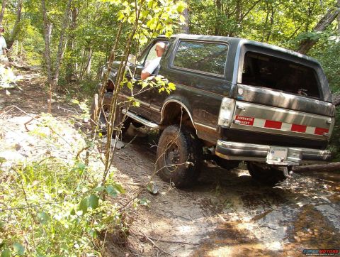 1988 Ford Bronco - This 1988 Ford Bronco navigates a challenging rocky terrain, its off-road capabilities.