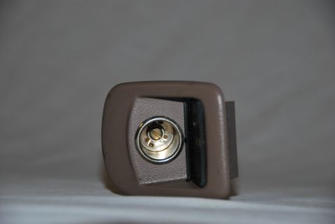 1994 Ford Bronco - A close-up view of a vehicle's dashboard speaker component.