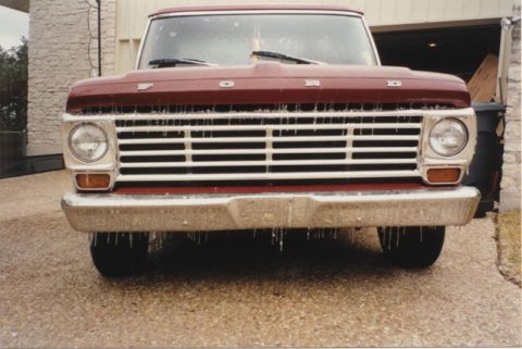 1967 Ford F-100 - Front view of a 1967 Ford F-100 with icicles hanging from the grille and bumper.