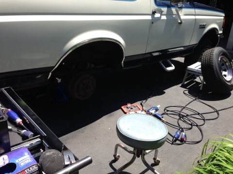 1989 Ford Bronco - Prepping for new rear shocks.