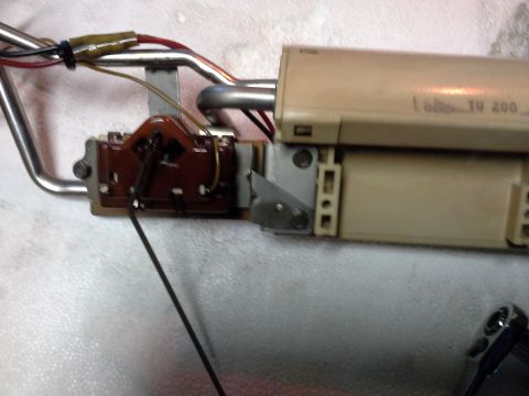 1996 Ford Bronco - There are 3 1/4 screws that holt the pump to the sender and float assembly that need to be removed