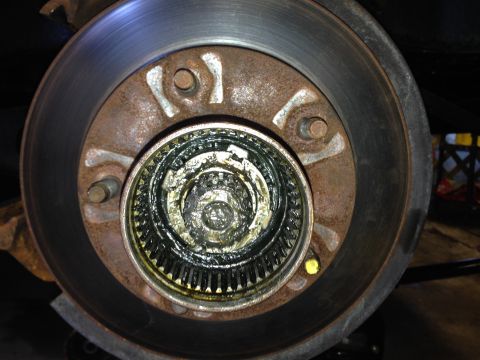 1989 Ford Bronco - Lock washer. You'll need a special 4-prong socket to unlock. You can get them at any auto parts store. Or ask around. Someone is bound to h…