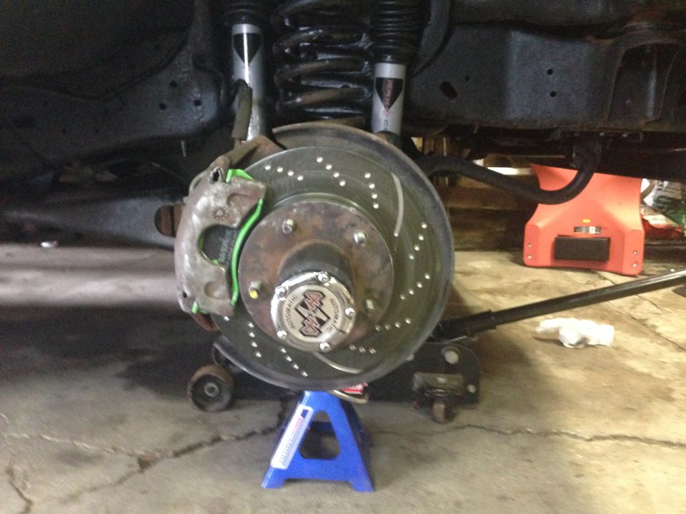 Closeup of completed job.  But you can see my error.  This is another reason to take pics of your work.  I put an extra twist in the brake line when I put the caliper back on.  You can see the pigtail in the line.  When I saw this pic I took the tire off and fixed the caliper.
