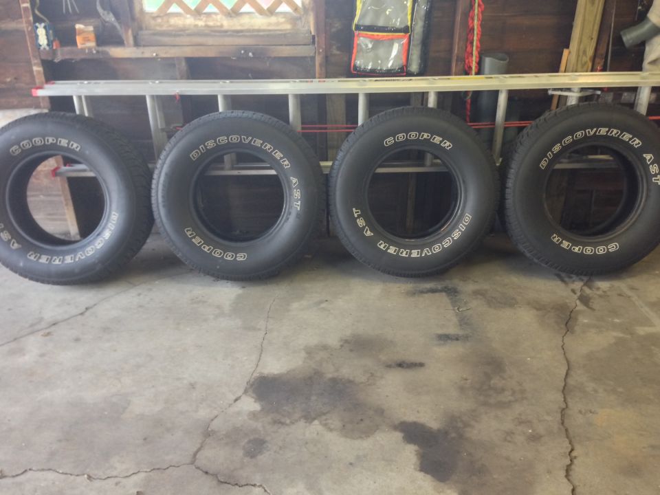 Old tires.  Shop wanted to charge me $25/tire for a "disposal fee".  Blow me.  Had em sold same afternoon to some off-road buddies.  Flat spots and all.  $25 a pop.  Just saved $200.  Disposal fee.  Yeah, right.