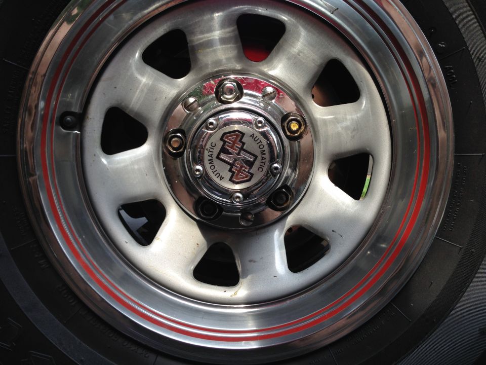 So, with all the upgrades over the first few months I was taking the wheels off over and over and had several of the cheap ass lugs lose their stupid glued-on caps.  Effin ugly!