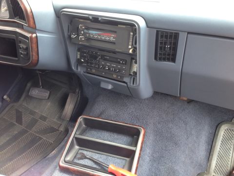 1989 Ford Bronco - Using the trim panel pry tool to take the bevel off.