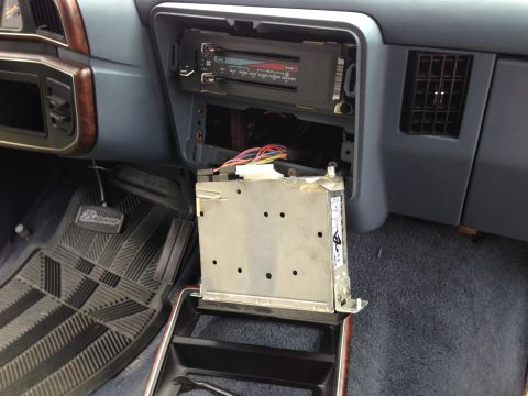 1989 Ford Bronco - Pull radio out to access the antenna wire, power harness and speaker harness.