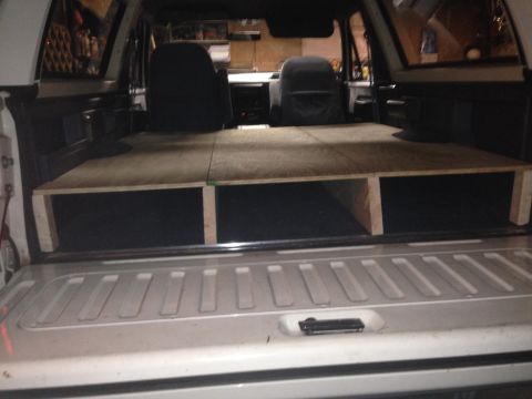 1989 Ford Bronco - 8" raised deck. 3 slots for storing skis.