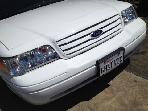 2004 Ford Crown Victoria - The grille design and headlights suggest a 2003 Ford Crown Victoria, not a 2004 model.