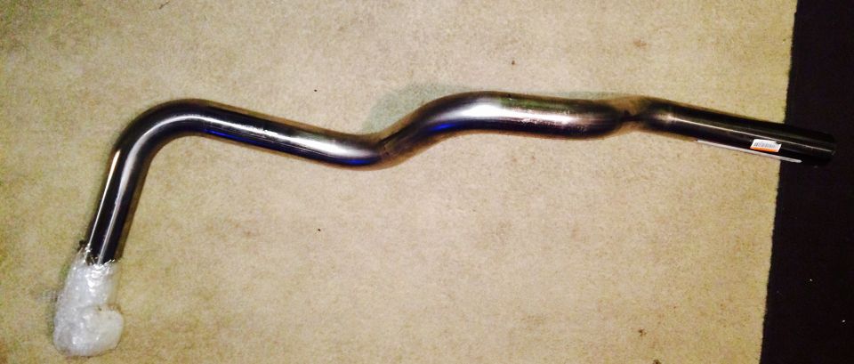 Curved exhaust pipe with SuperMotors logo