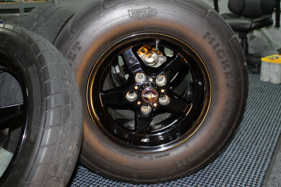 Black drag wheel with Mickey Thompson ET Street tire close-up