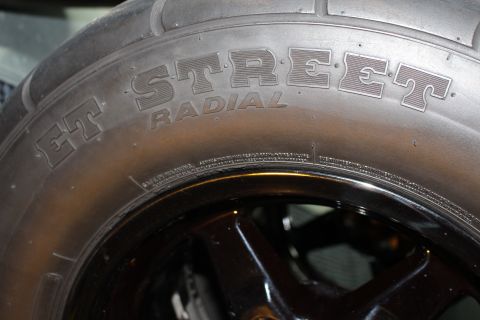 2003 Ford Crown Victoria - A close-up view of a tire with 'ET Street Radial' molded into the sidewall.