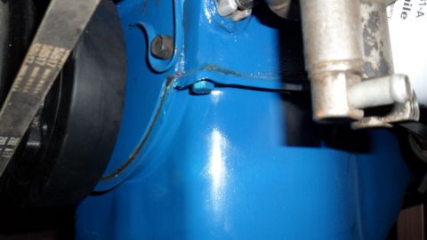 1972 Ford Ranchero - Close-up of a painted engine part, likely from a Ford vehicle.