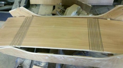 1982 Ford Bronco - Wooden part with parallel grooves, possibly for a vehicle console.