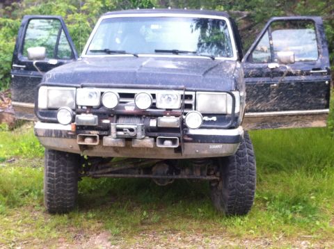 1988 Ford Bronco - This 1988 Ford Bronco is shown with its doors open and a winch mounted on the front bumper.