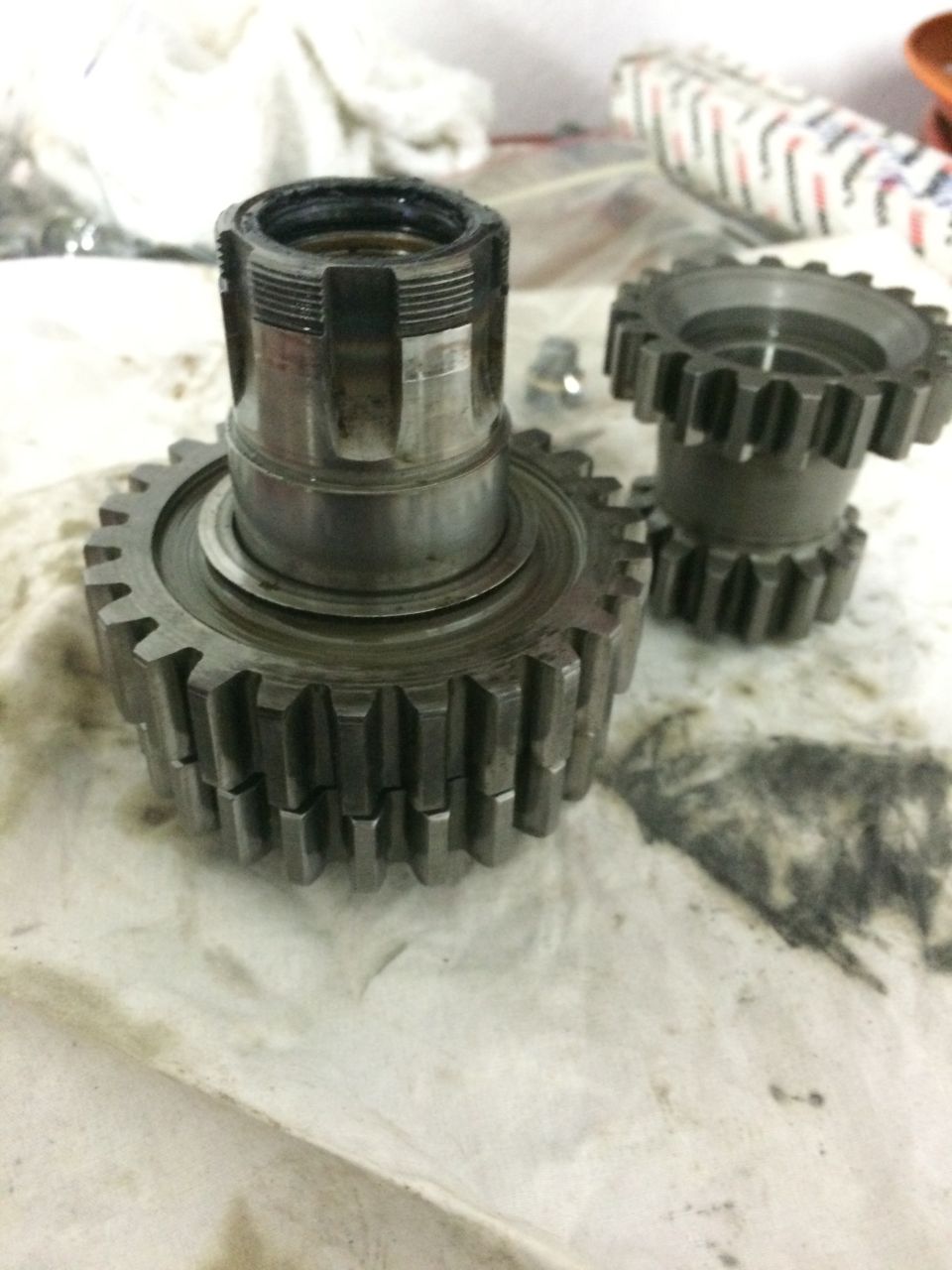1975 Shovelhead four speed transmission main gear set on top of third next to low and second