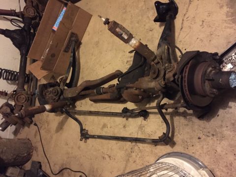 1994 Ford Bronco - This is a vehicle's front axle assembly, likely for a truck or SUV, shown disassembled.