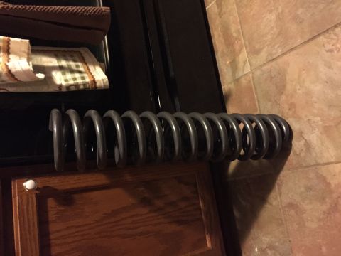1994 Ford Bronco - A single suspension coil spring is shown, not a 1994 Ford Bronco.