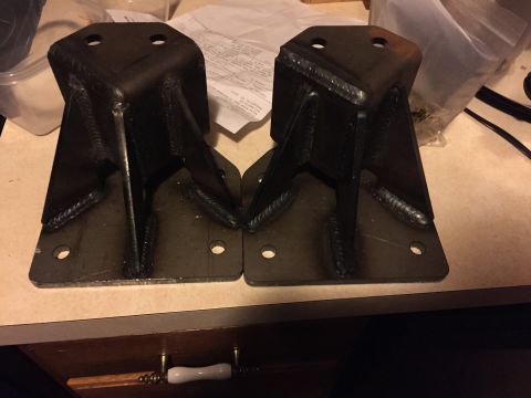 1994 Ford Bronco - These custom-fabricated metal brackets appear to be for automotive use, possibly for suspension or mounting components.