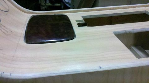 1982 Ford Bronco - Wooden dashboard panel in progress, showing cutouts for components and a dark insert.