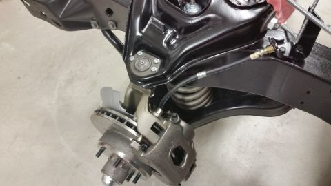 1970 Pontiac Trans Am - Close-up of a vehicle's front suspension system, showing brake components.