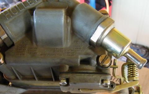 1968 Mercury Cougar - Close-up of a Holley carburetor, showing its intricate mechanical details and branding.
