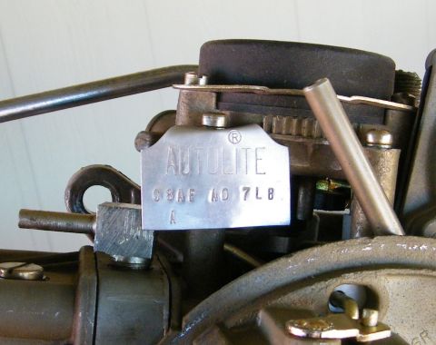 1968 Mercury Cougar - A close-up view of an Autolite carburetor, showing its part number and branding.