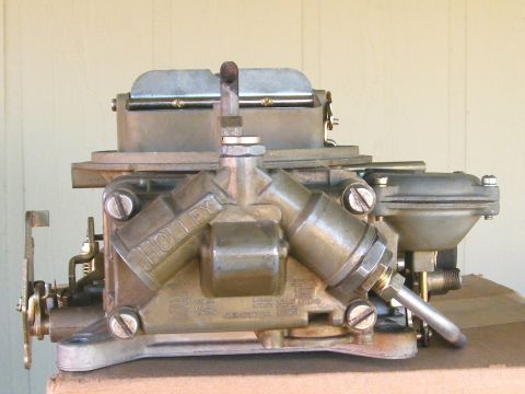 1968 Mercury Cougar - A close-up view of a Holley carburetor, a crucial component for internal combustion engines.