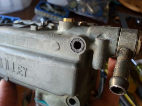 1981 Ford Bronco - I had to ream these paper gaskets out with a small screwdriver. I highly recommend replacing them with nylon gaskets.