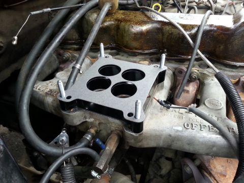 1981 Ford Bronco - The spacer installed. The rounded tips of the studs are really nice for installing the nuts.