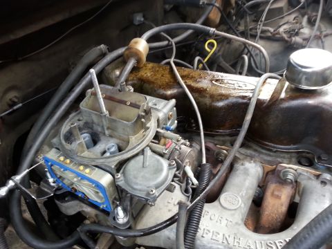 1981 Ford Bronco - Metering block installed and the carb in place.