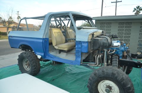 1979 Ford Bronco - This 1979 Ford Bronco is being restored, a roll cage and a two-tone blue and gray paint scheme.