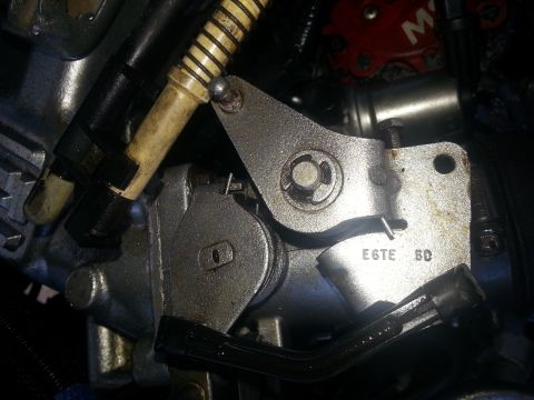 1994 Ford Bronco - Throttle body linkage assembly with visible part number E6TE 60.
