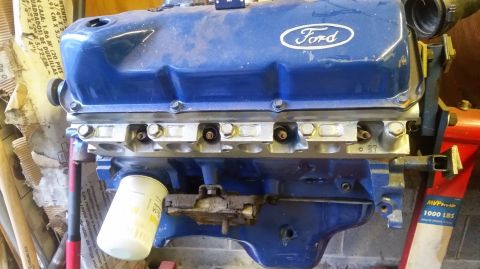1979 Ford F-150 - A blue Ford engine, likely from a 1979 F-150, is shown with an oil filter attached.