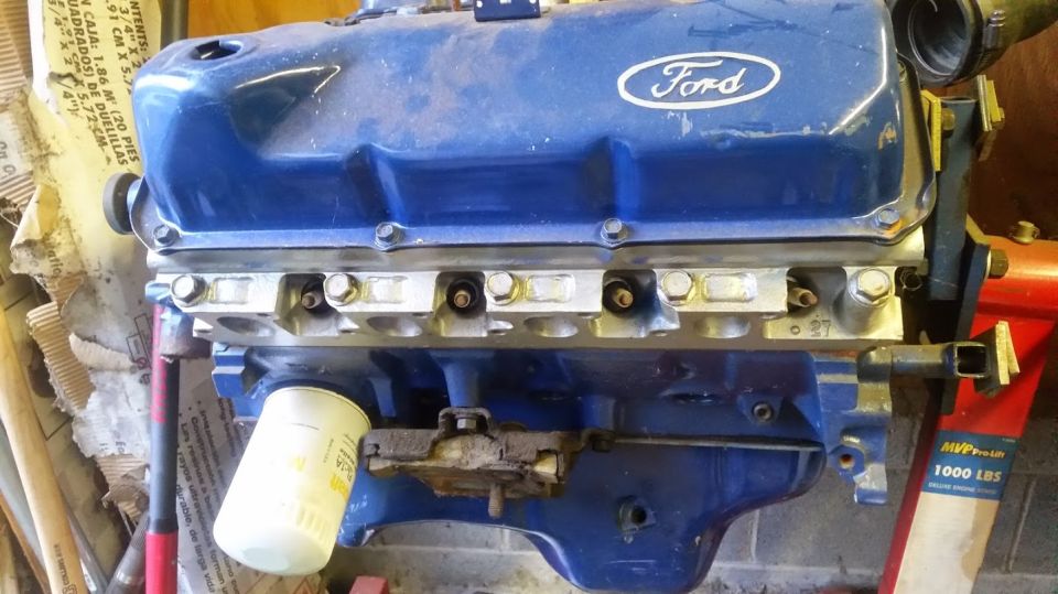 Blue Ford engine with oil filter and "Ford" emblem
